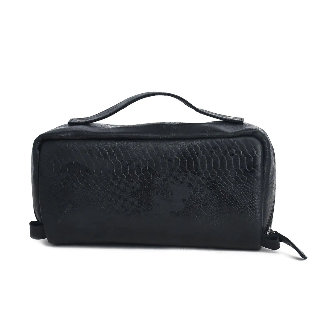 Black leather textured toiletry bag on a white background