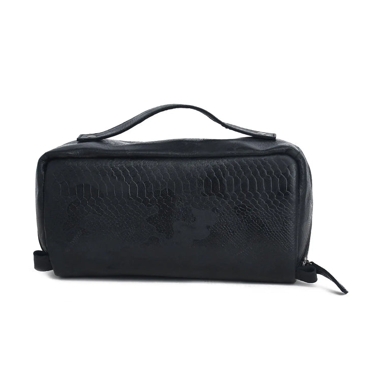 Black leather textured toiletry bag on a white background