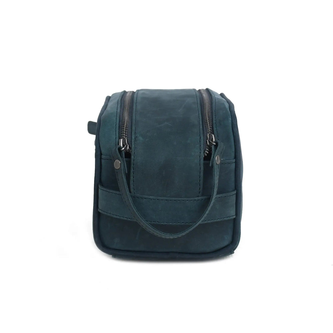 Blue leather Toiletry Bag with a strap on a white background