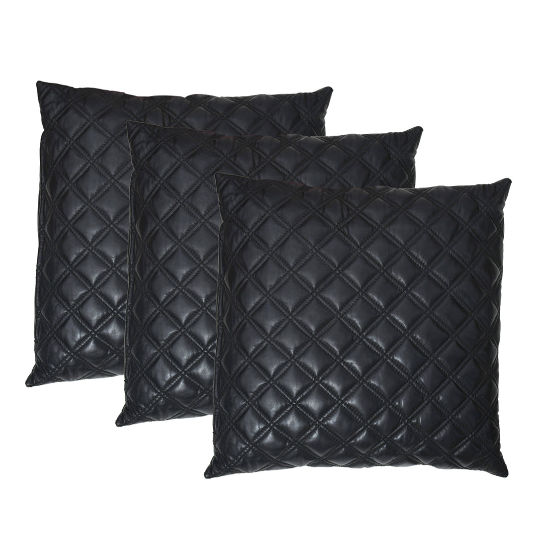 Three black quilted pillows on a white background

