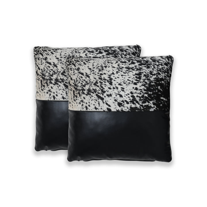 Two decorative pillows with black and white pattern on a white background