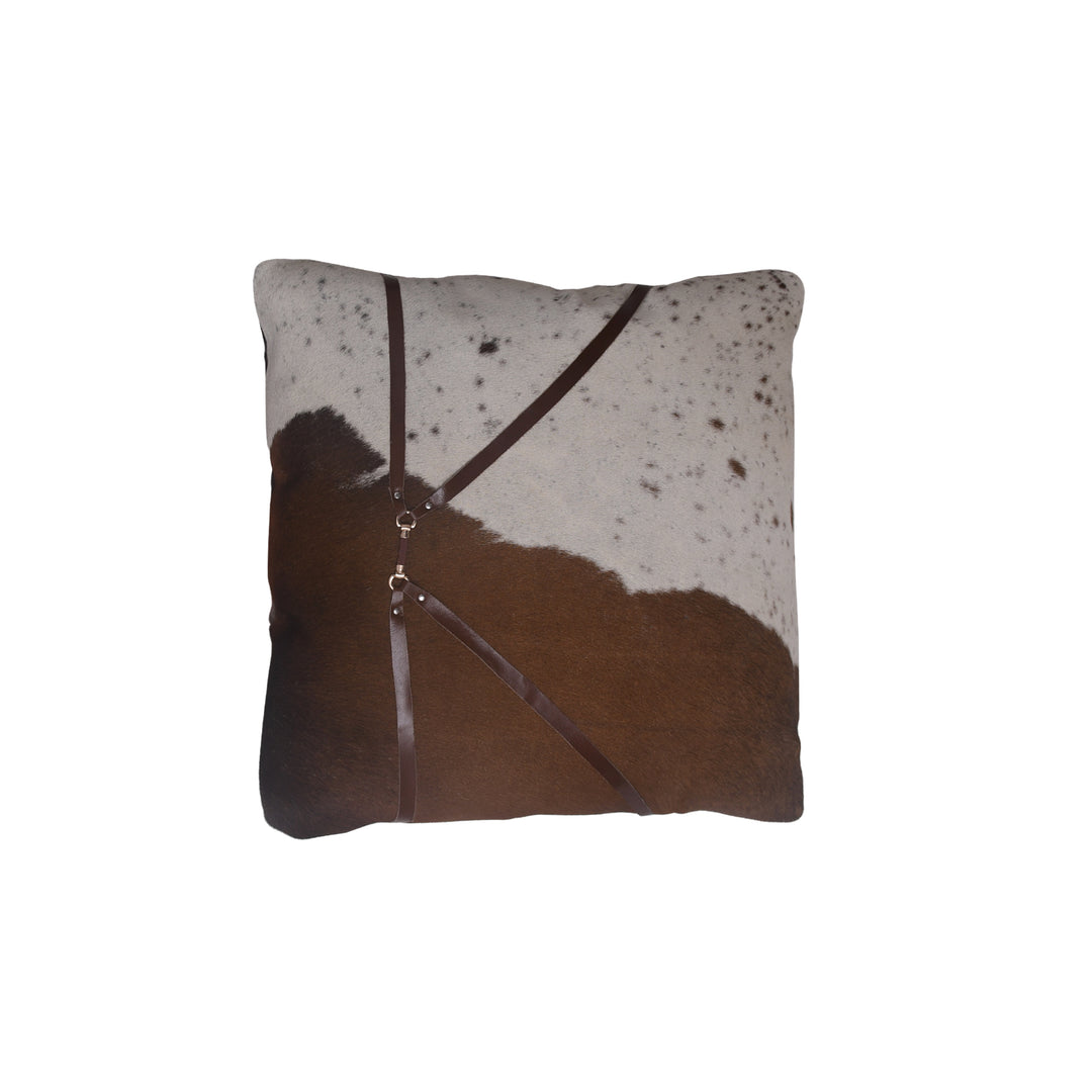 Square pillow with brown and white cowhide pattern on a white background