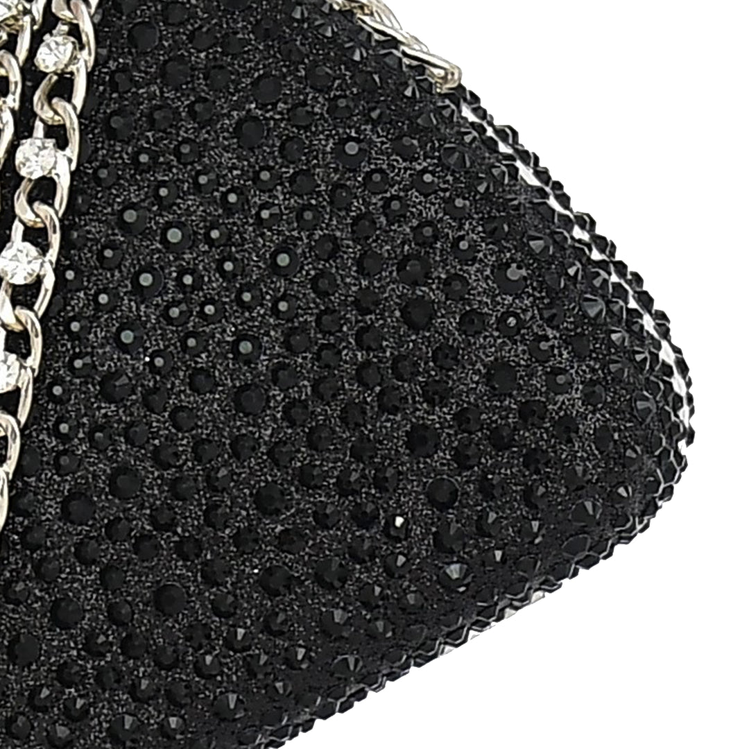 Black clutch bag with rhinestone embellishments on a white background