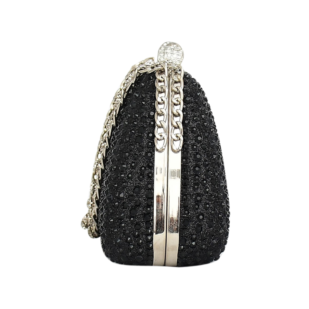 Black beaded clutch with silver chain strap on a white background