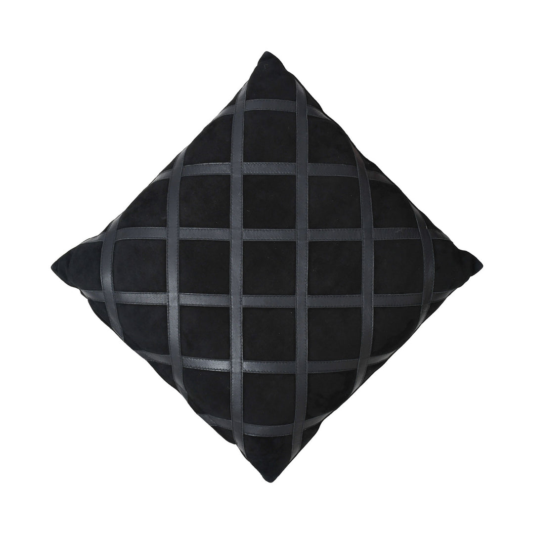Black pillow with a grid pattern on a white background

