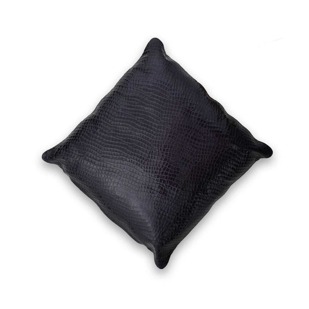 Black textured pillow on a white background

