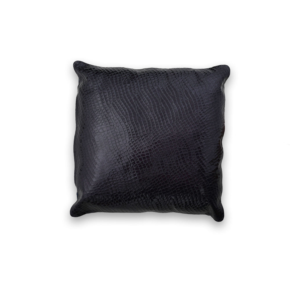 Black textured pillow on a white background

