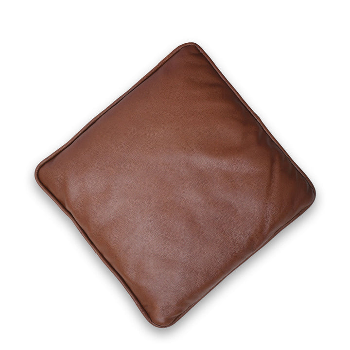 Brown leather pillow on a white background

