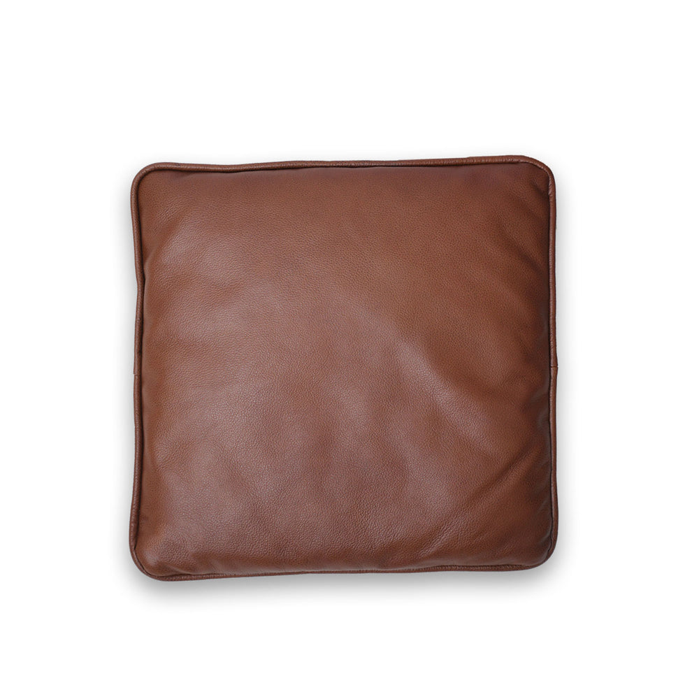Brown leather pillow on a white background

