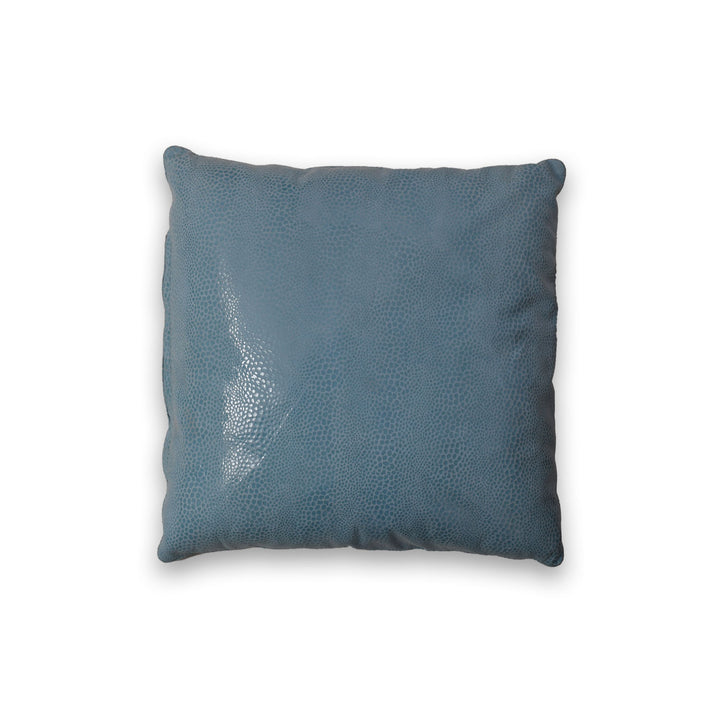 Blue textured pillow on a white background

