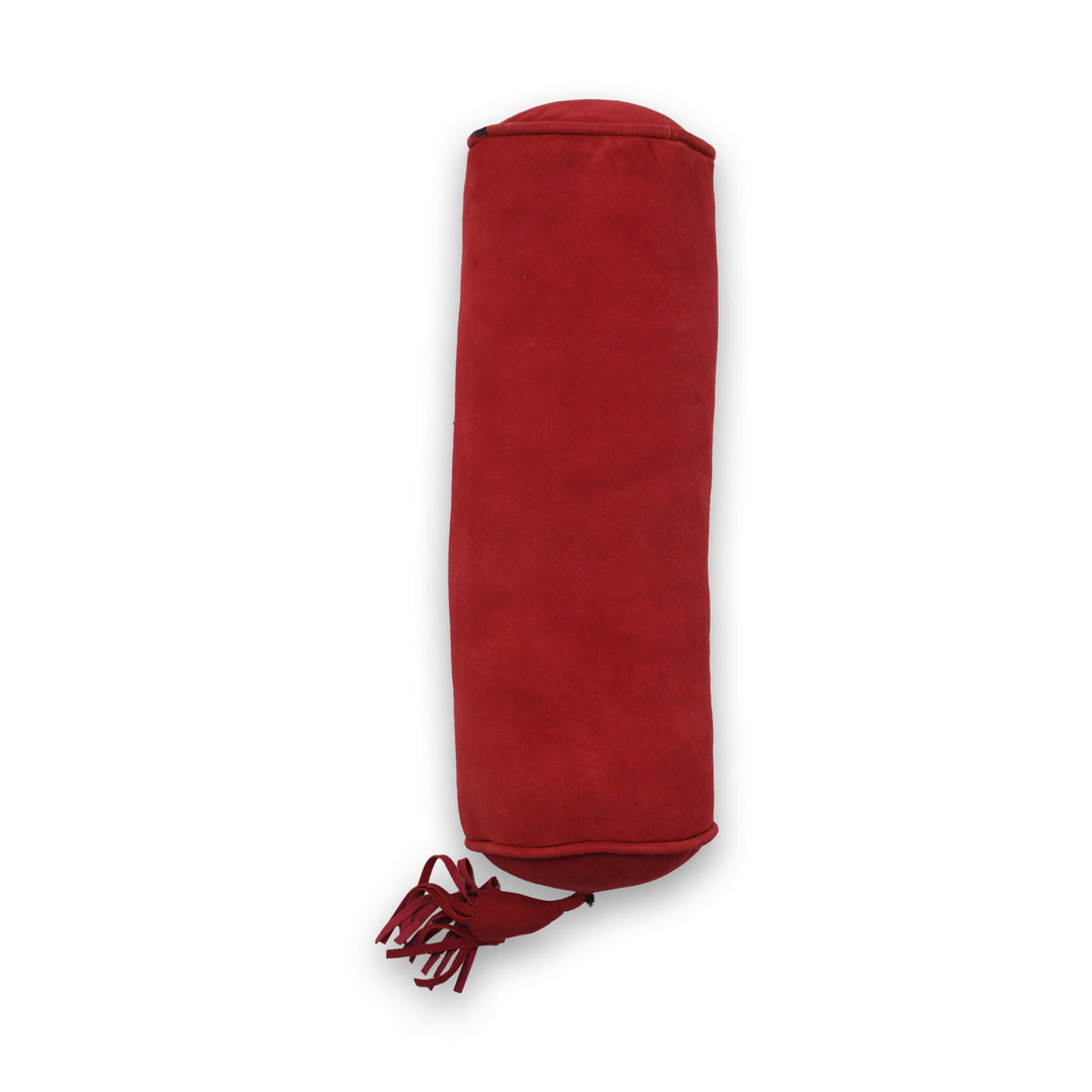 Red fabric roll with tassels on a white background