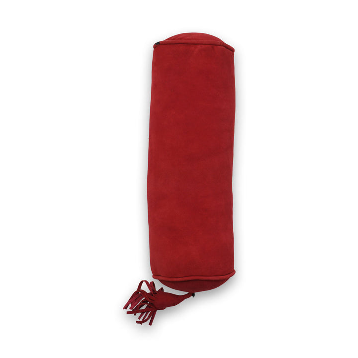 Red fabric roll with tassels on a white background