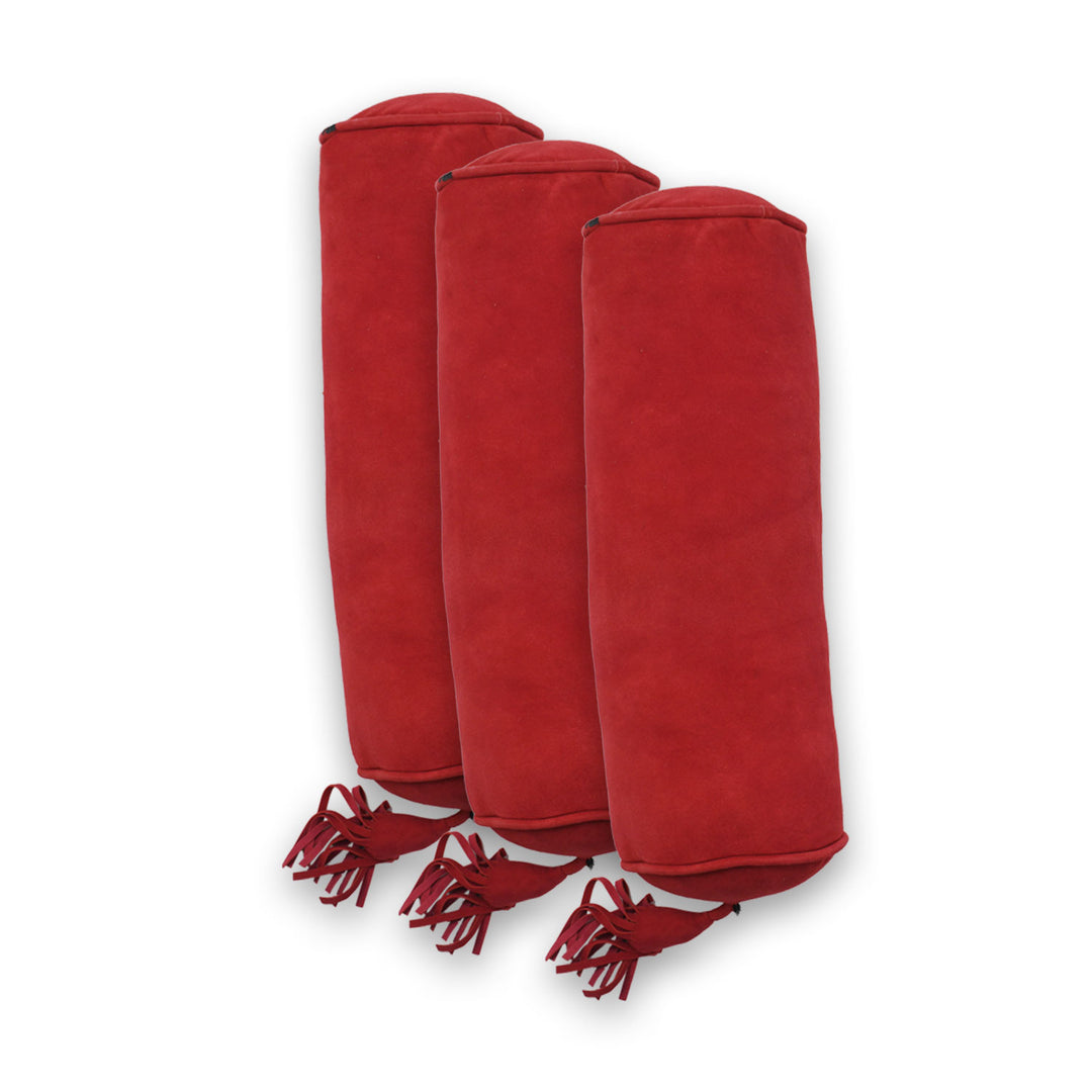Three red folded cloths with tassels on a white background