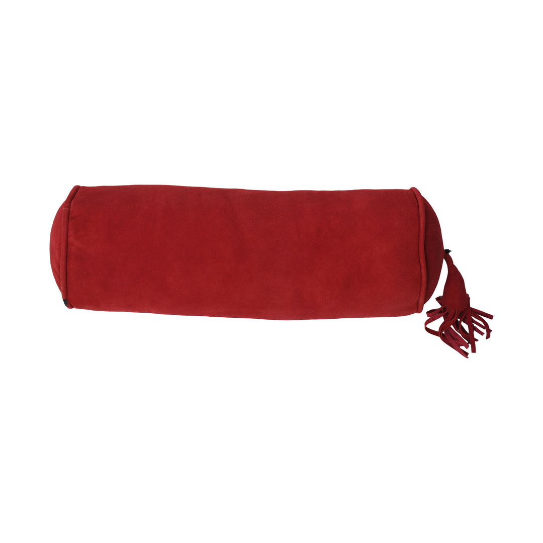Red cylindrical pillow with a tassel on a white background