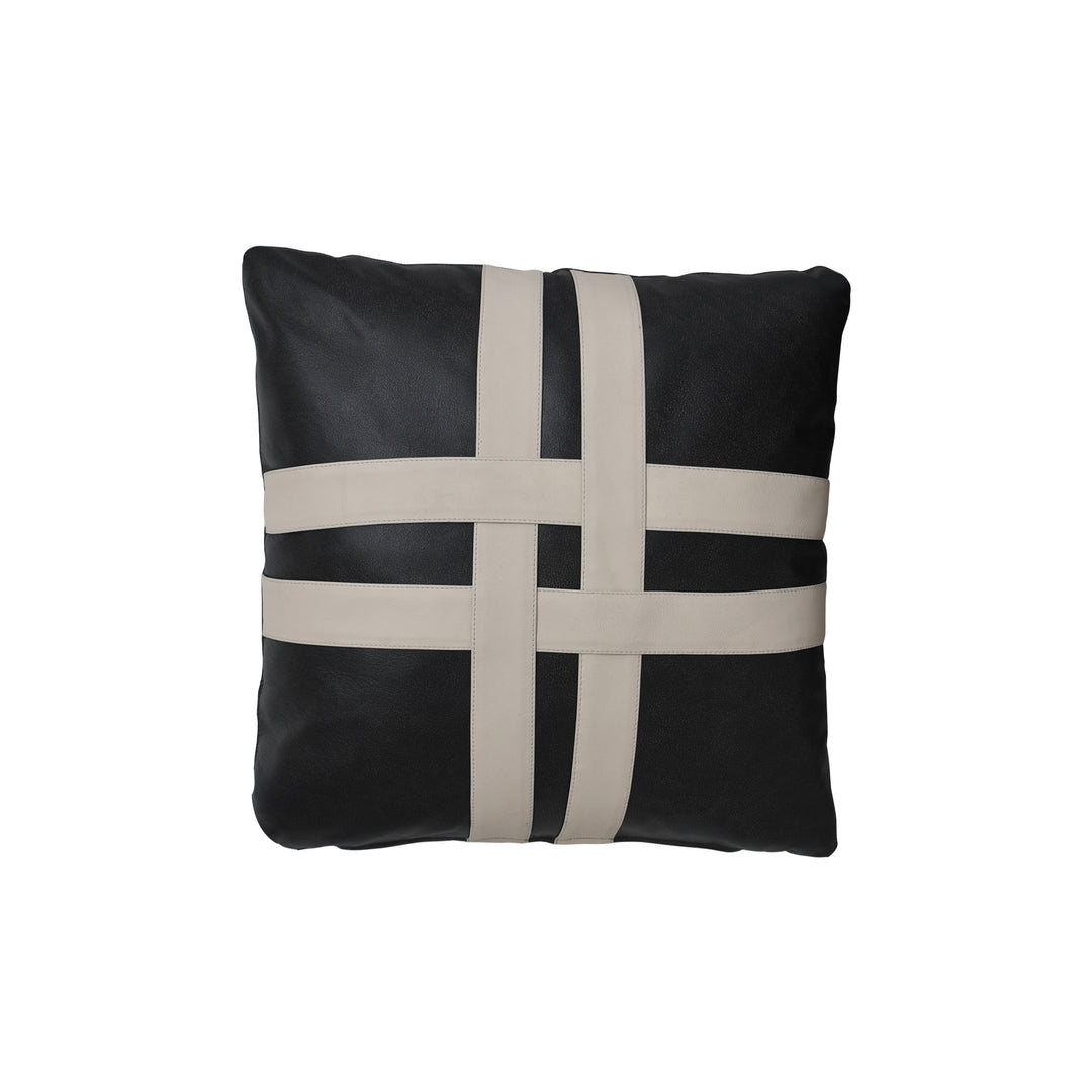 Black and beige cross-patterned pillow on a white background