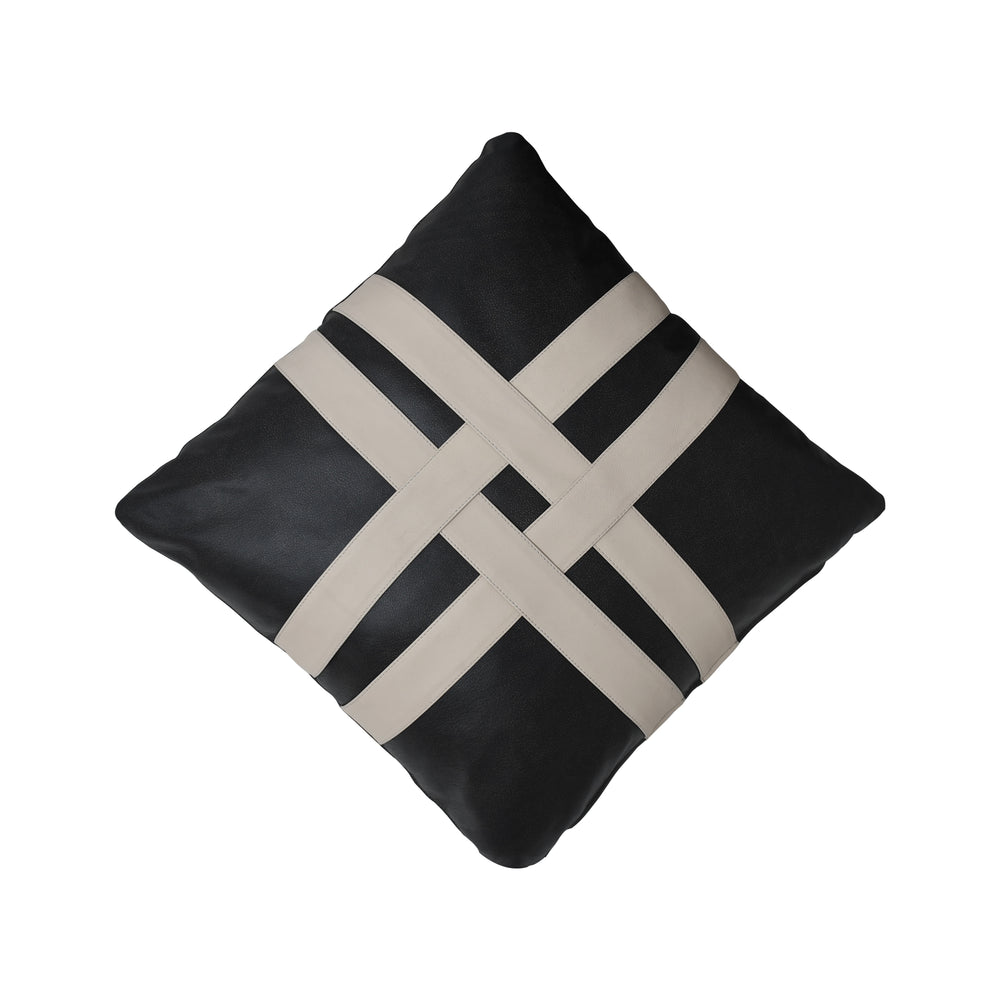 Black and beige woven patterned pillow on a white background