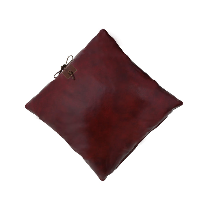 Brown leather pouch with a strap on a white background