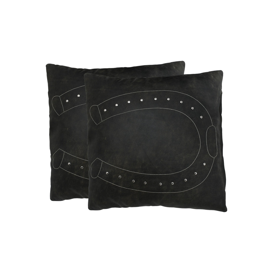 Two black pillows with horseshoe designs on a white background