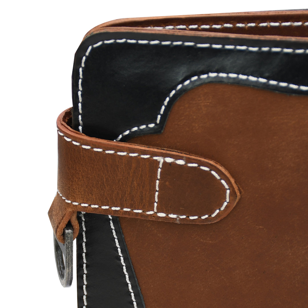 Close-up of a brown leather product with white stitching on a white background
