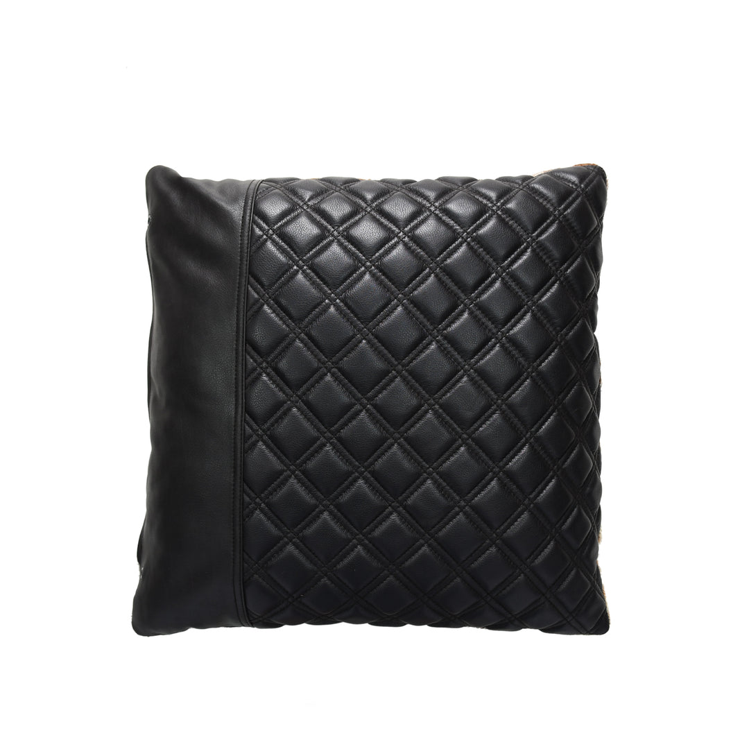 Black quilted pillow on a white background