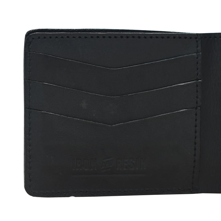 Black leather wallet with visible brand name on a white background