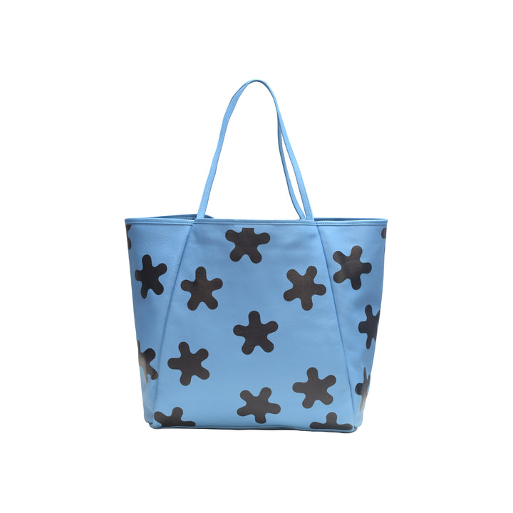 Blue tote bag with brown star patterns on a white background