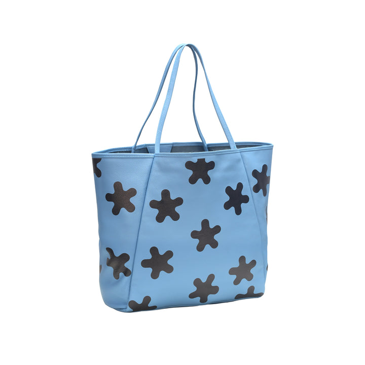 Blue tote bag with brown star patterns on a white background