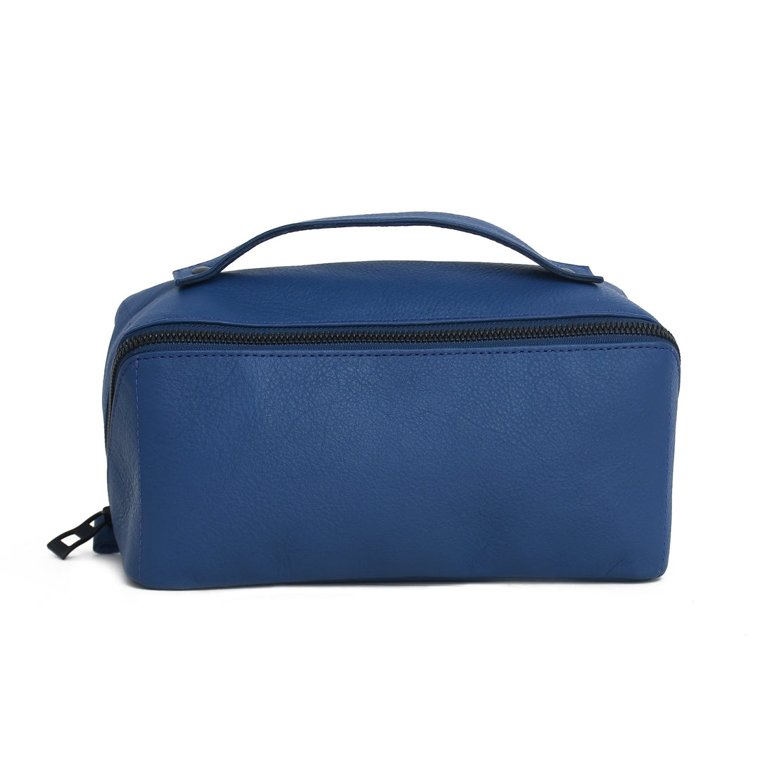 Blue toiletry bag with a handle on a white background