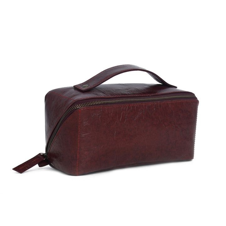 Leather toiletry bag on a white background