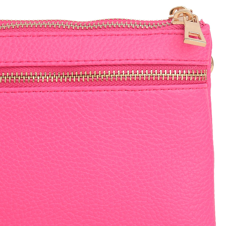 Pink handbag with a strap on a white background