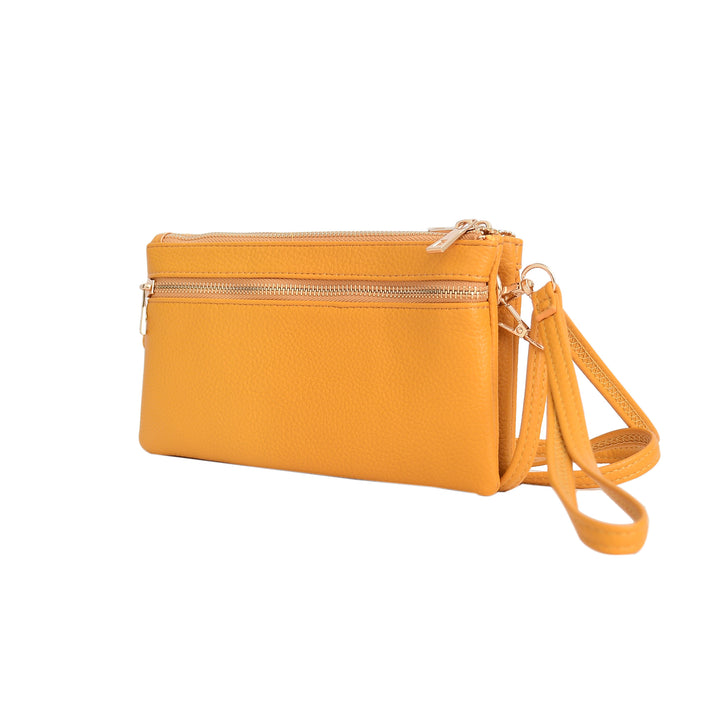 Yellow crossbody bag with a strap on a white background
