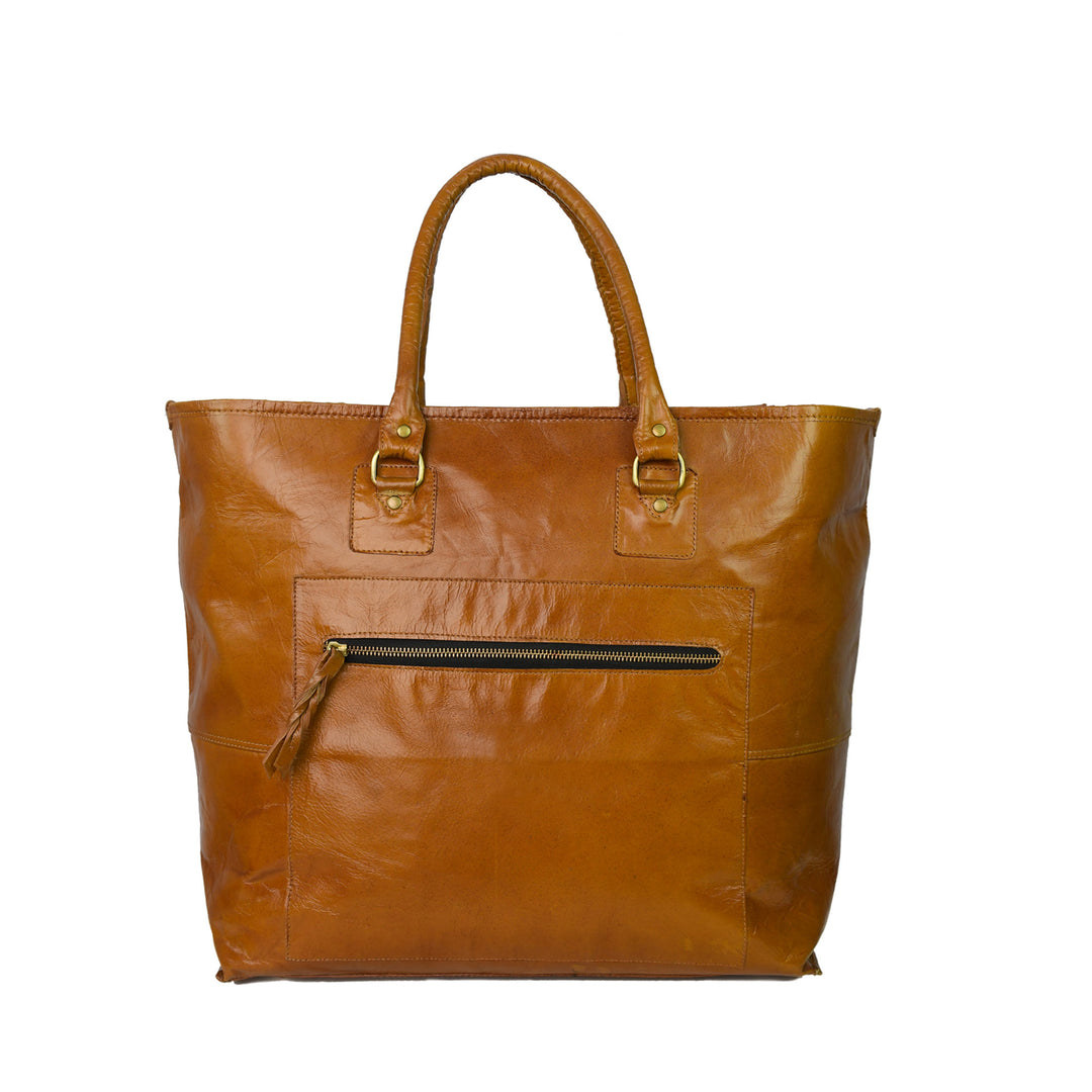 Brown leather tote bag with gold hardware on a white background