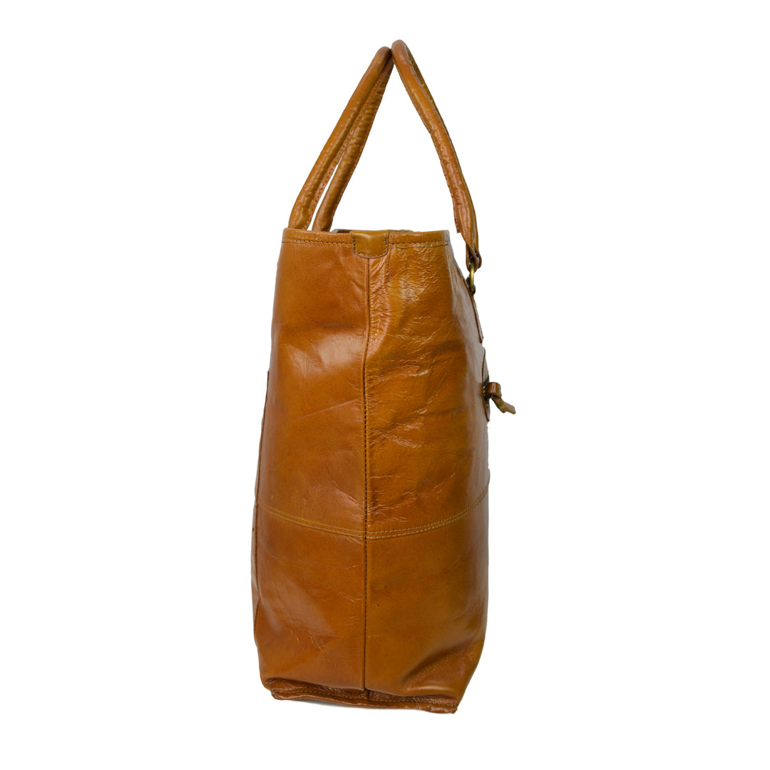 Brown leather tote bag on a white background