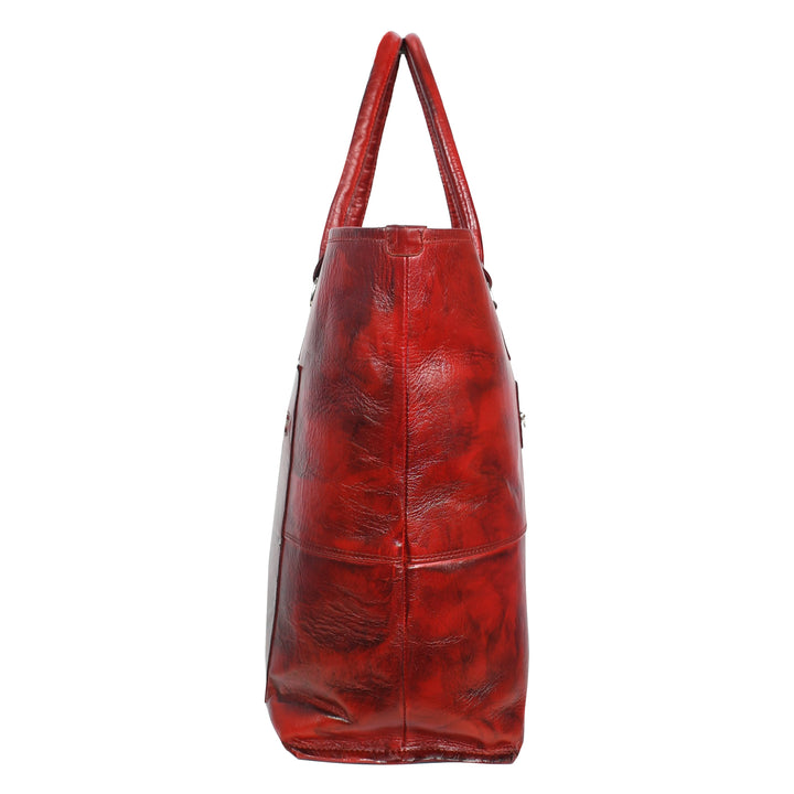 Red leather handbag on a white background