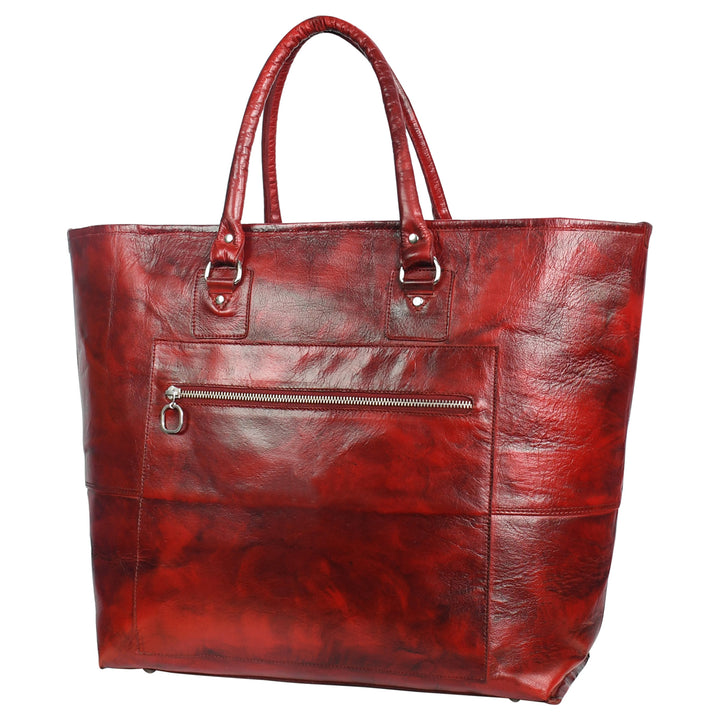 Red leather tote bag with a zipper on a white background