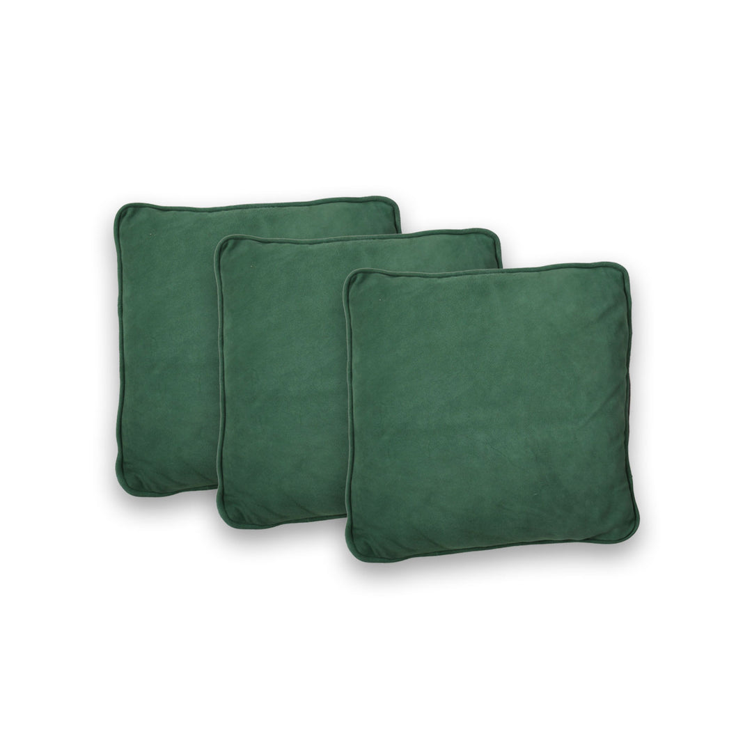 Three green pillows on a white background

