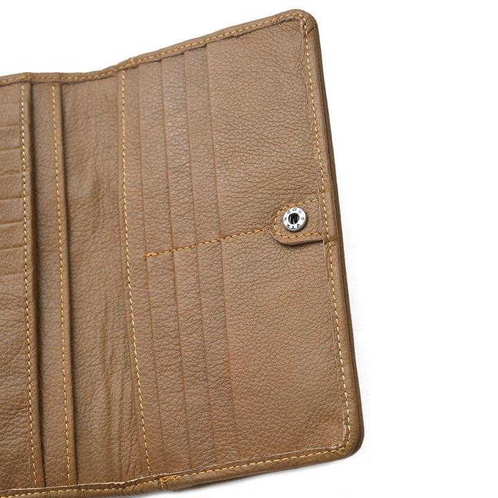 Close-up of a brown leather wallet with stitching details on a white background