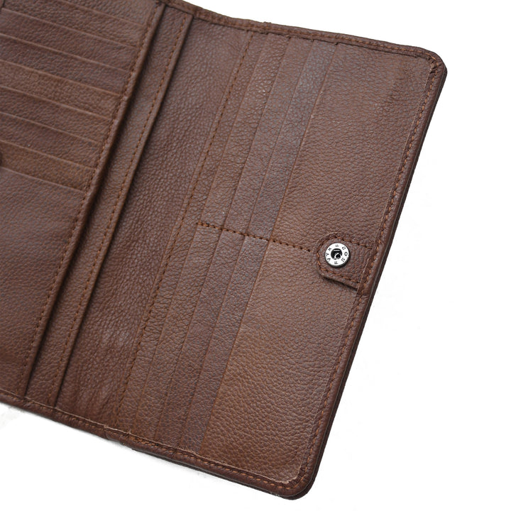 Close-up of a brown leather wallet on a white background