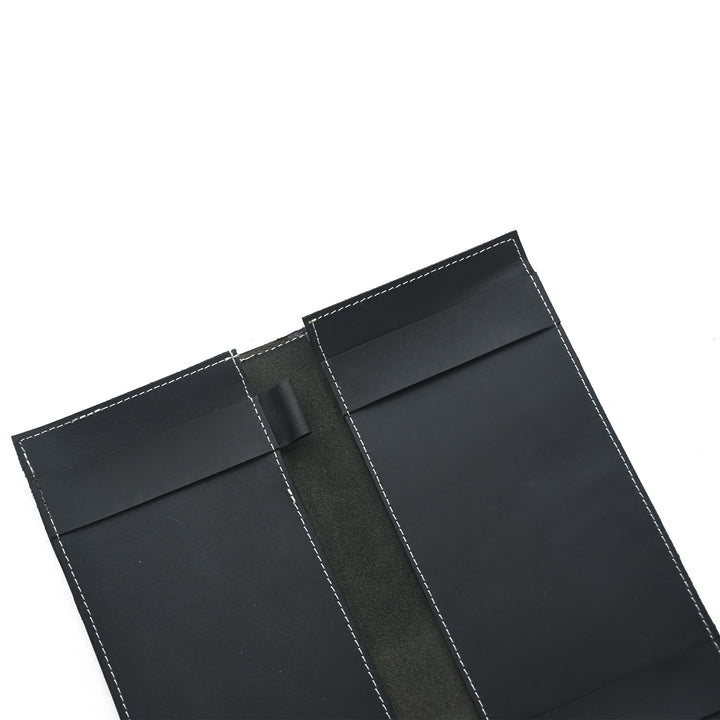 Black leather wallet with a strap on a white background