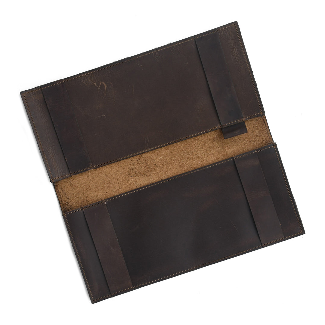 Brown leather case with a strap on a white background