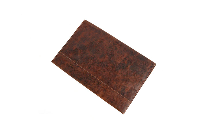 Brown leather laptop sleeves on a white background