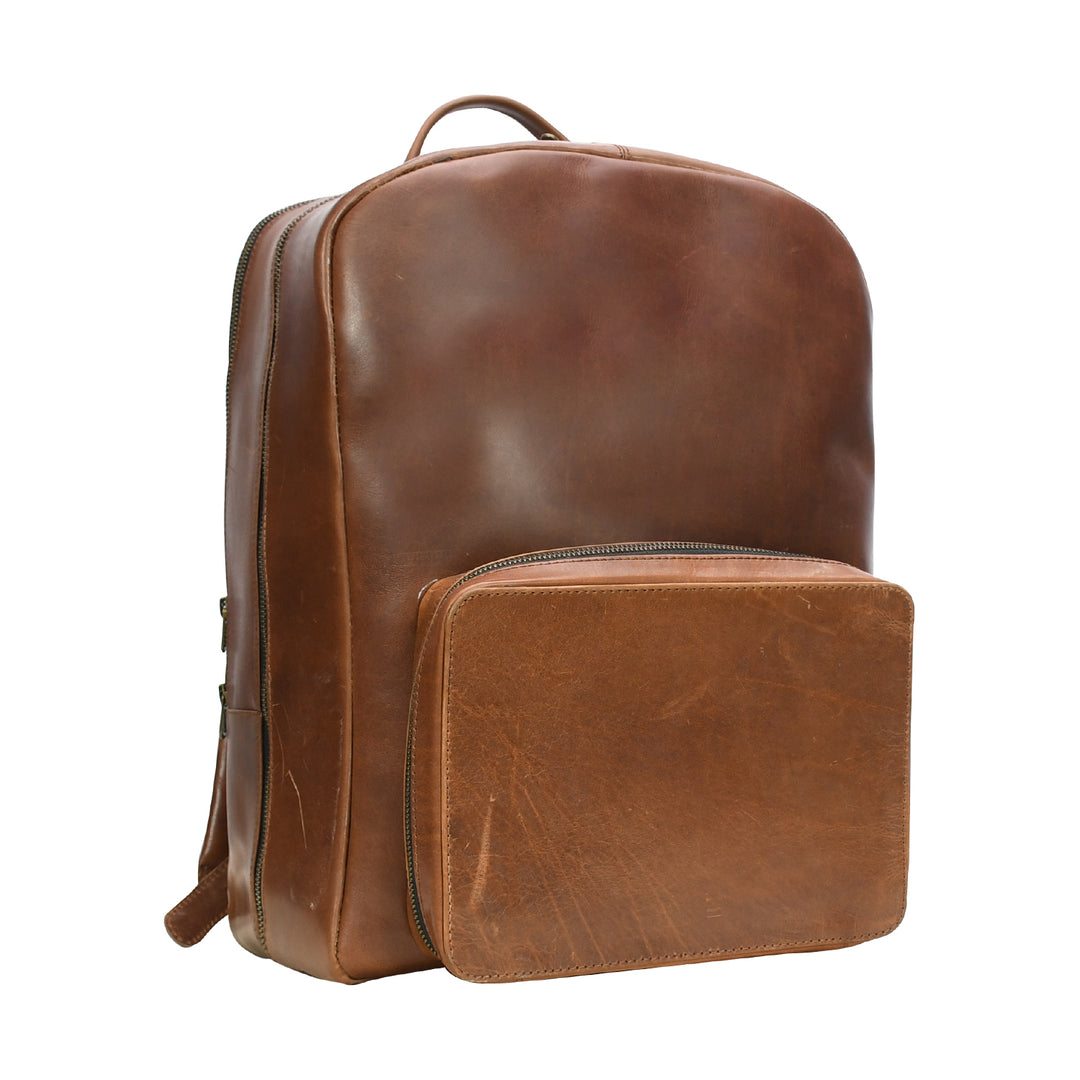 Brown leather backpack on a white background