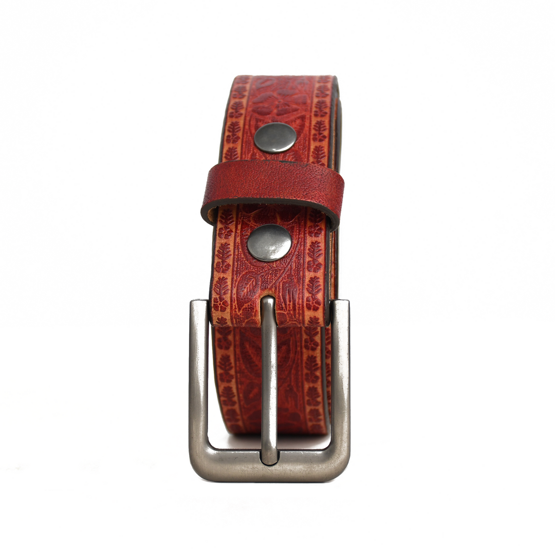Red leather belt with silver buckle on a white background