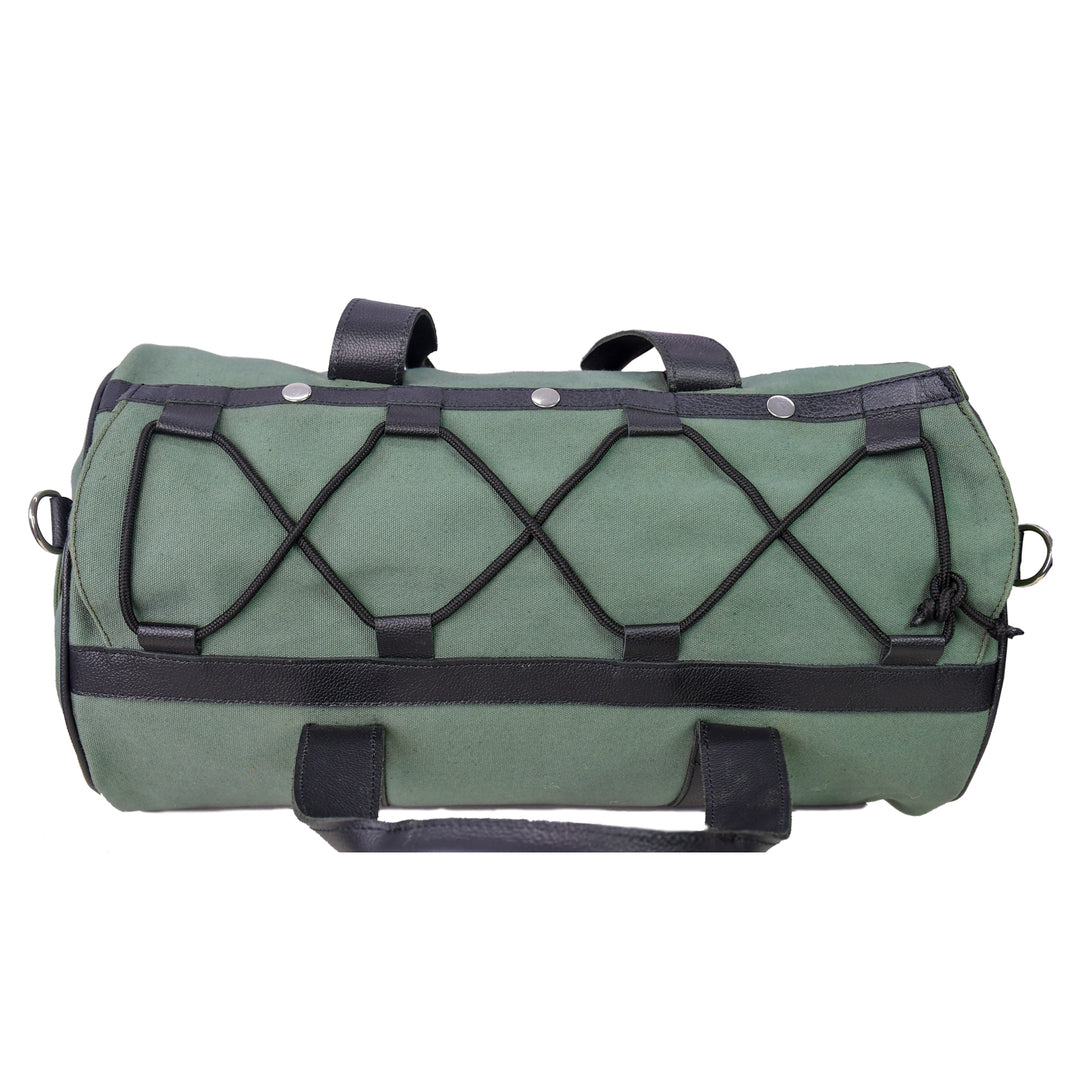 Green duffel bag with black straps on a white background