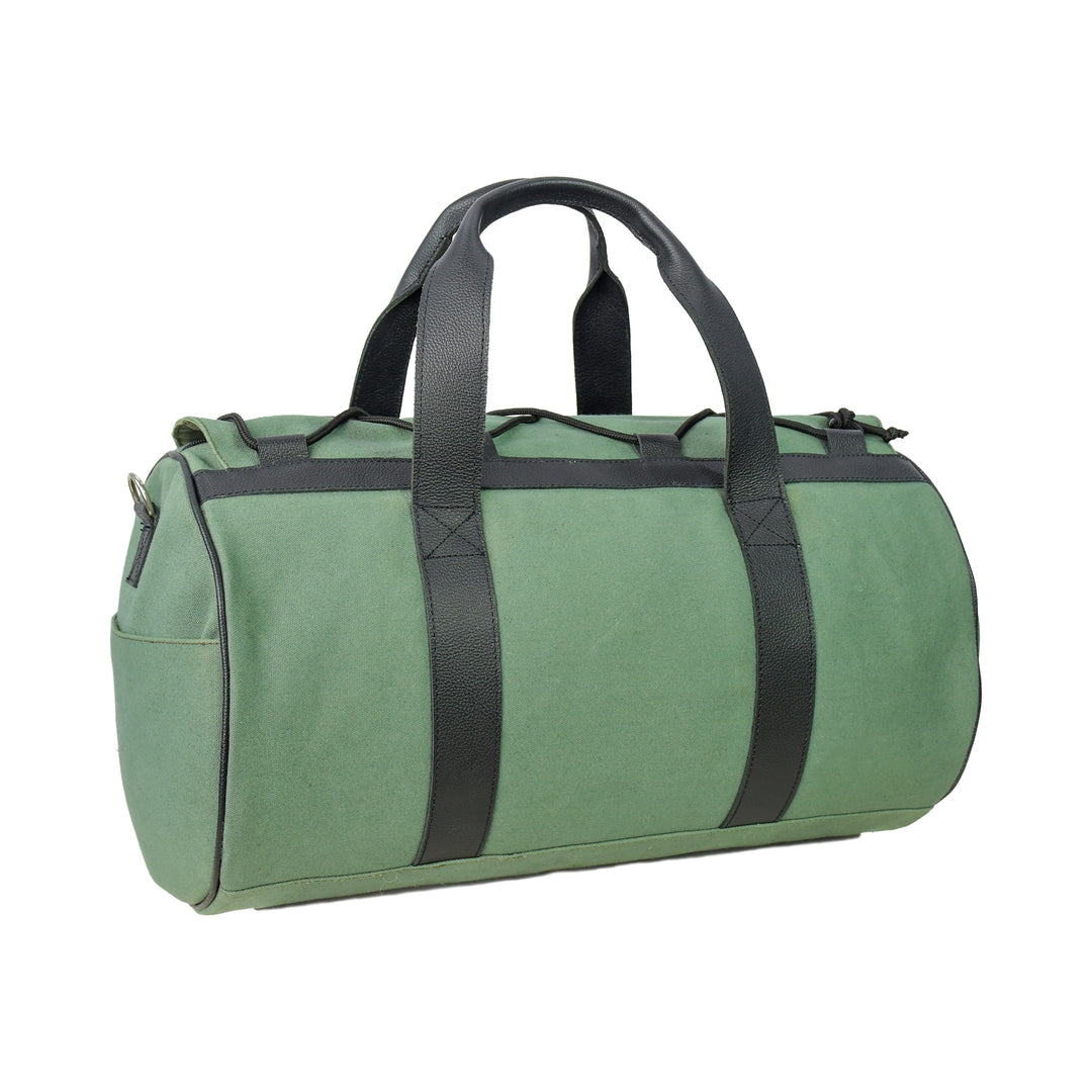 Green duffel bag with black straps on a white background