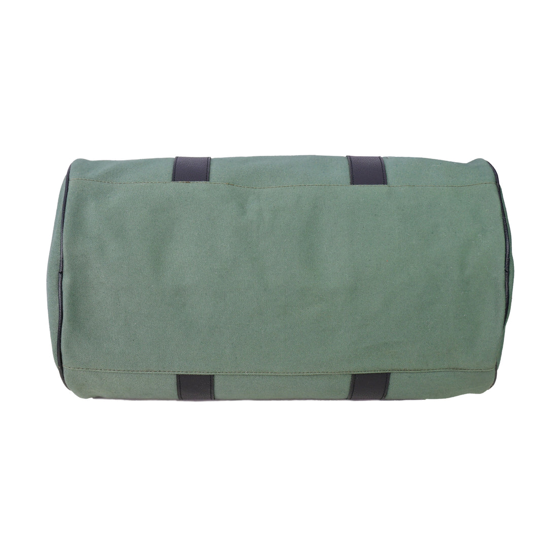 Green roll-up bag with black straps on a white background