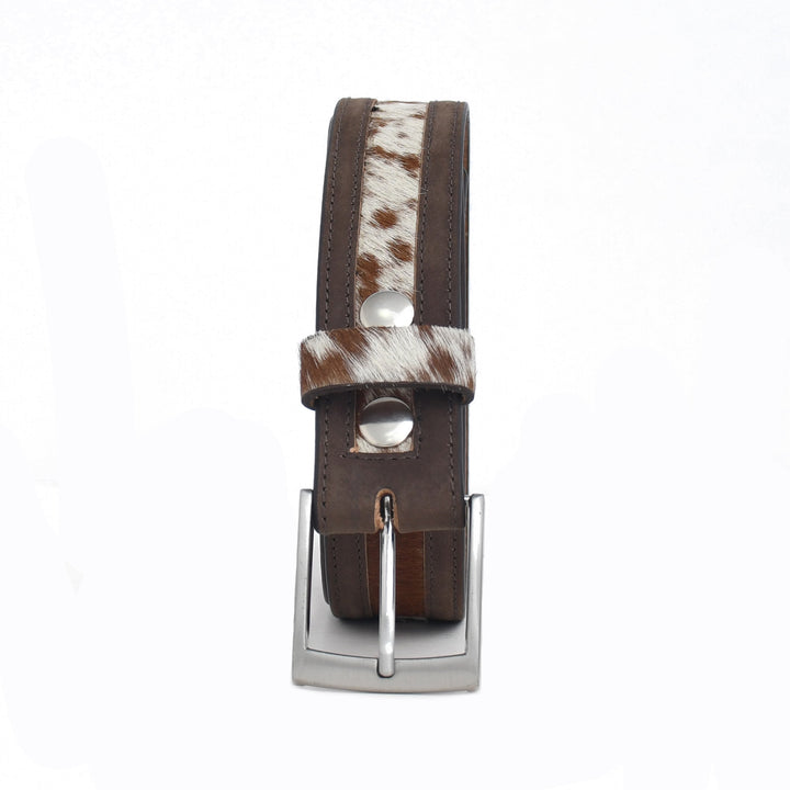 Belt with cowhide strap and silver buckle on a white background