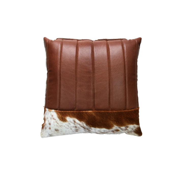 Brown leather pillow with cowhide pattern on a white background
