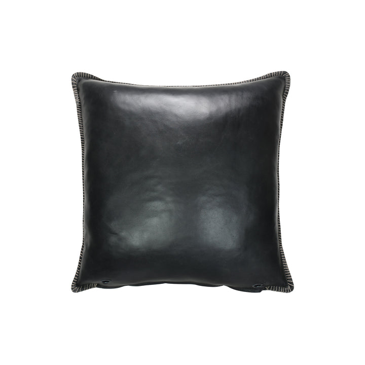 Black leather pillow on a white background
