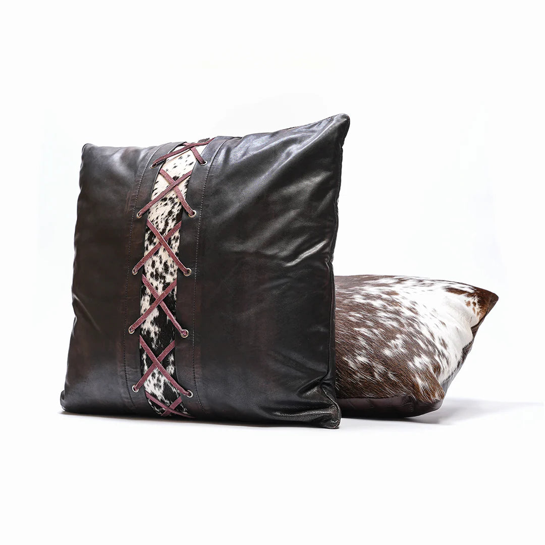 Cowhide leather cushion on a white background 